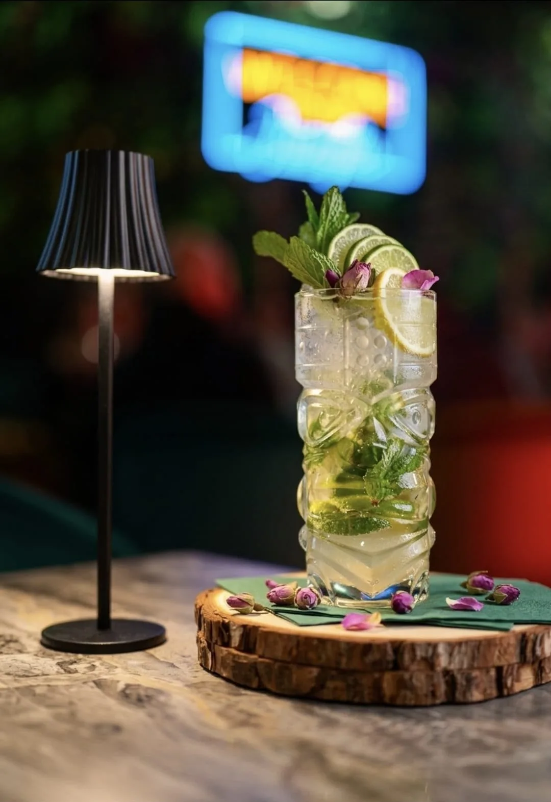 Mojito with fresh mint and lime in a tiki glass at Jungle cocktail bar Radolfzell
